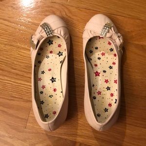 Pink heels with rhinestone bow